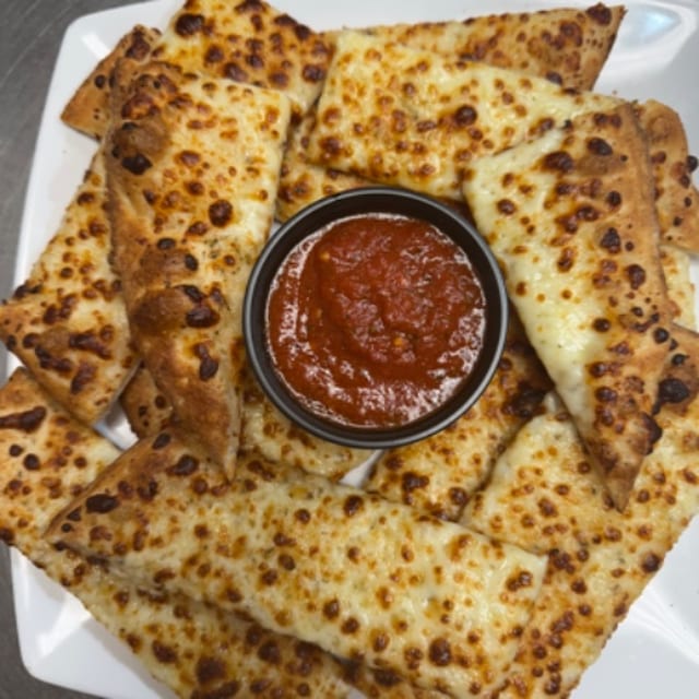 Cheese Bread Sticks with Sauce.
